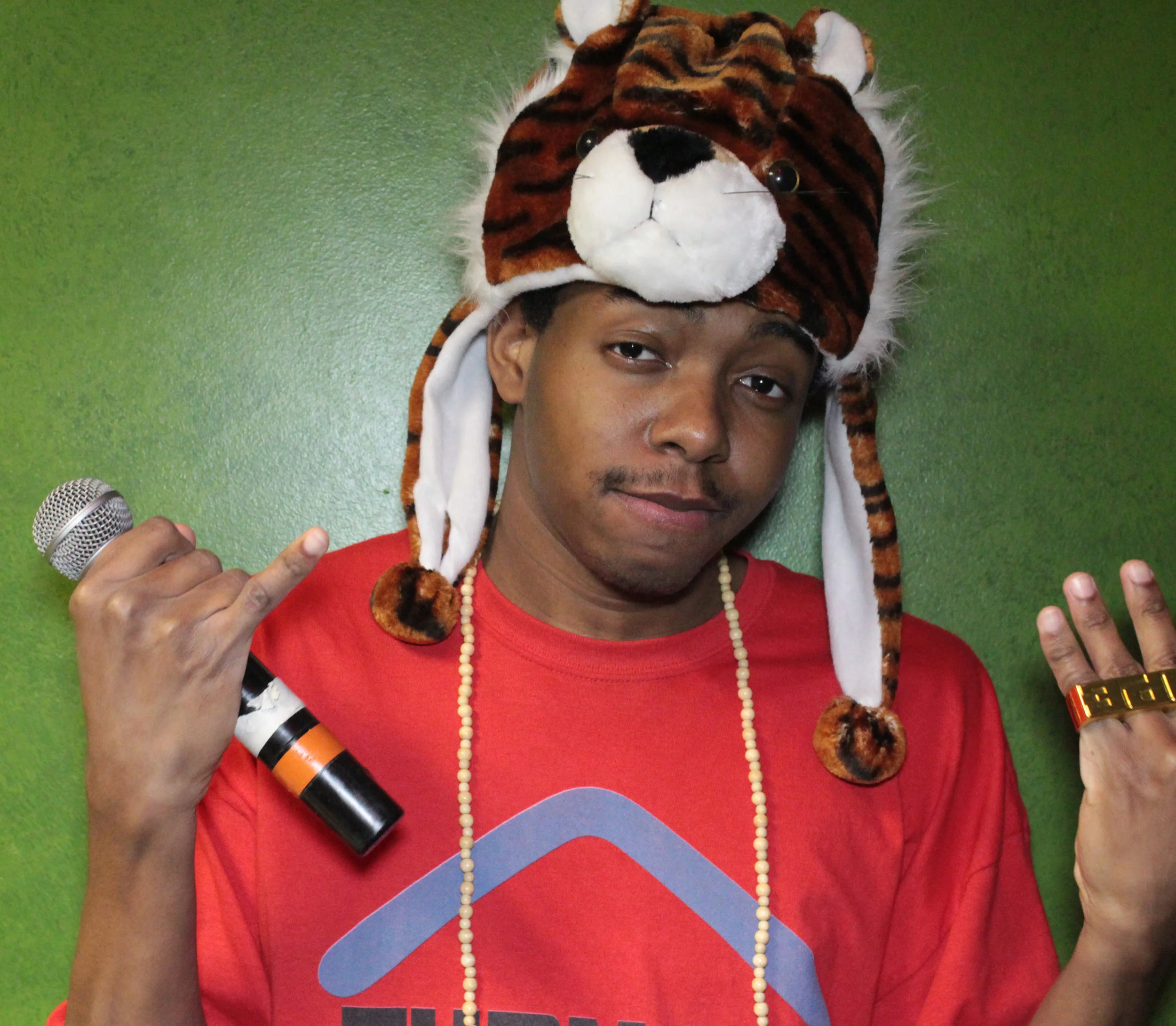 DJ Many with microphone